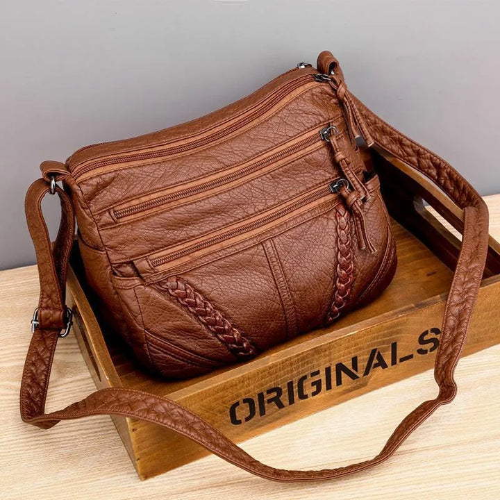Elegant women's luxury soft leather shoulder bag, perfect for daily use & style. Versatile handbag.