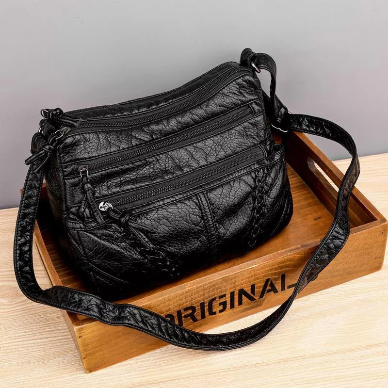 Practical women's soft leather shoulder bag & crossbody with elegant design. Ideal daily handbag.