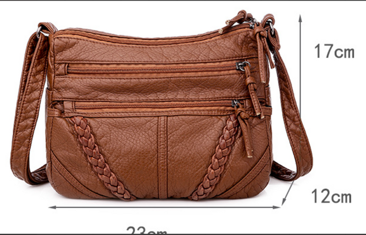 Luxurious women's soft leather shoulder bag, an elegant & practical handbag for daily essentials.