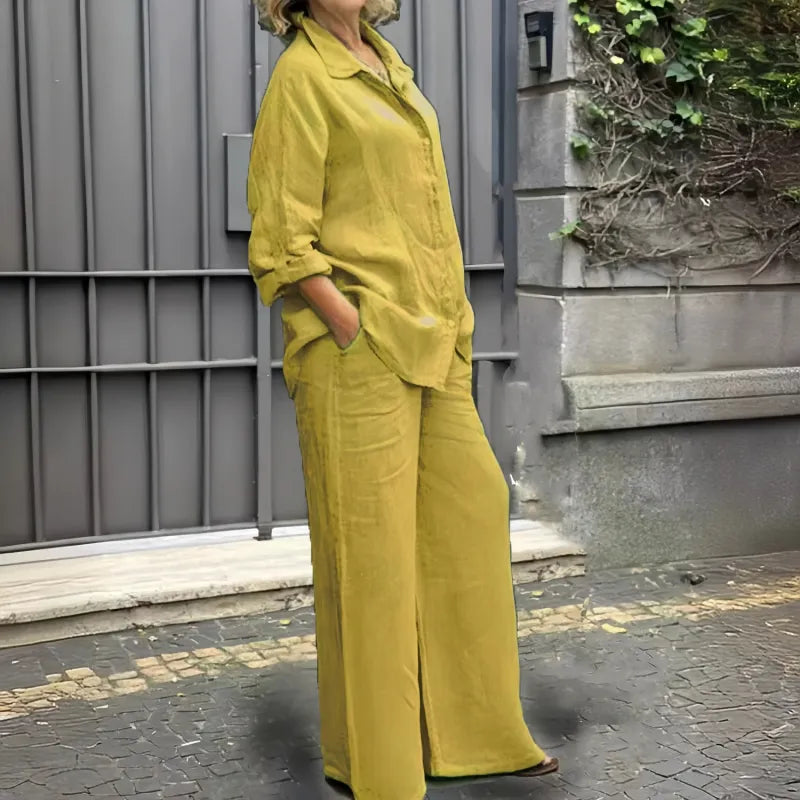 Elegant women's matching button-up shirt & wide-leg pants set. Chic two-piece co-ord for versatile styling.