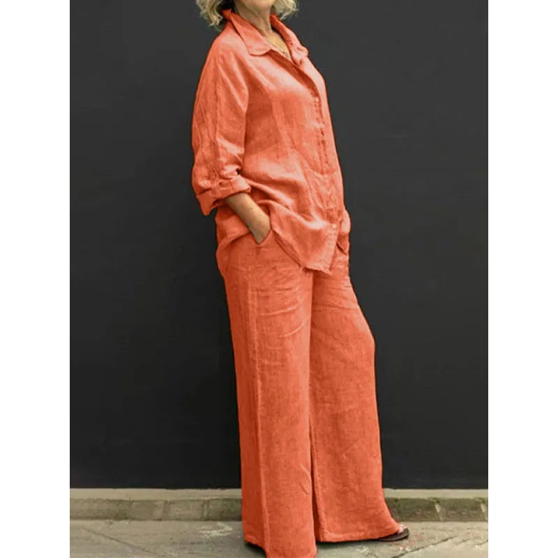 Chic women's matching set: elegant button-up shirt & wide-leg pants. Ideal for casual elegance or spring fashion.