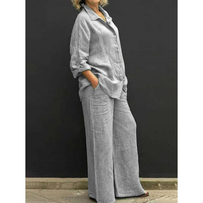 Sophisticated women's matching set with elegant button-up shirt & comfortable wide-leg pants. Versatile co-ord.
