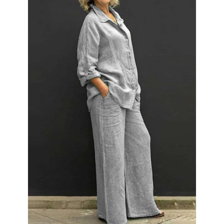 Sophisticated women's matching set with elegant button-up shirt & comfortable wide-leg pants. Versatile co-ord.