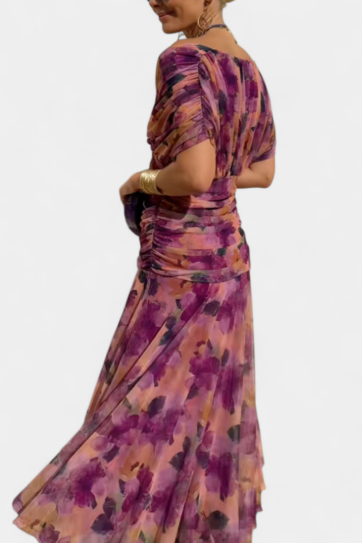 Women's elegant formal long dress, flowing design with a distinct pleated wrapped waist.