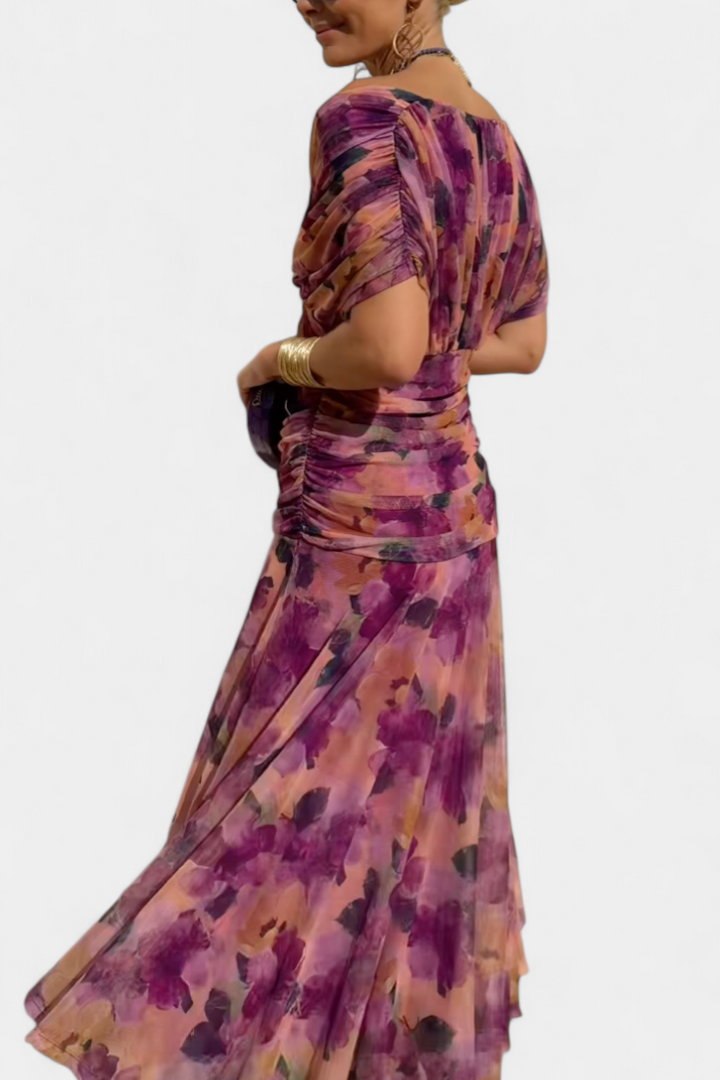 Women's elegant formal long dress, flowing design with a distinct pleated wrapped waist.