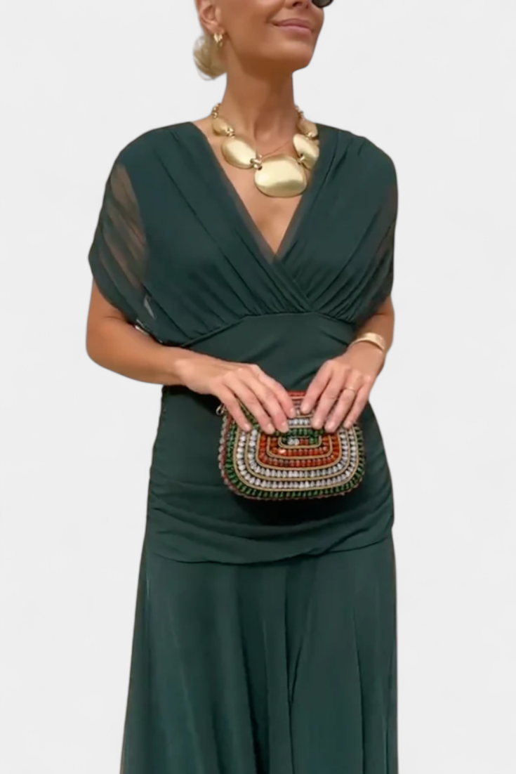 Formal women's long dress, elegant and chic, with a beautifully pleated wrapped waistline.