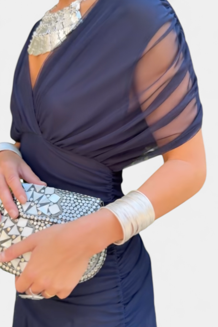 Long women's evening dress, perfect for formal events, with a stylish pleated wrapped waist.