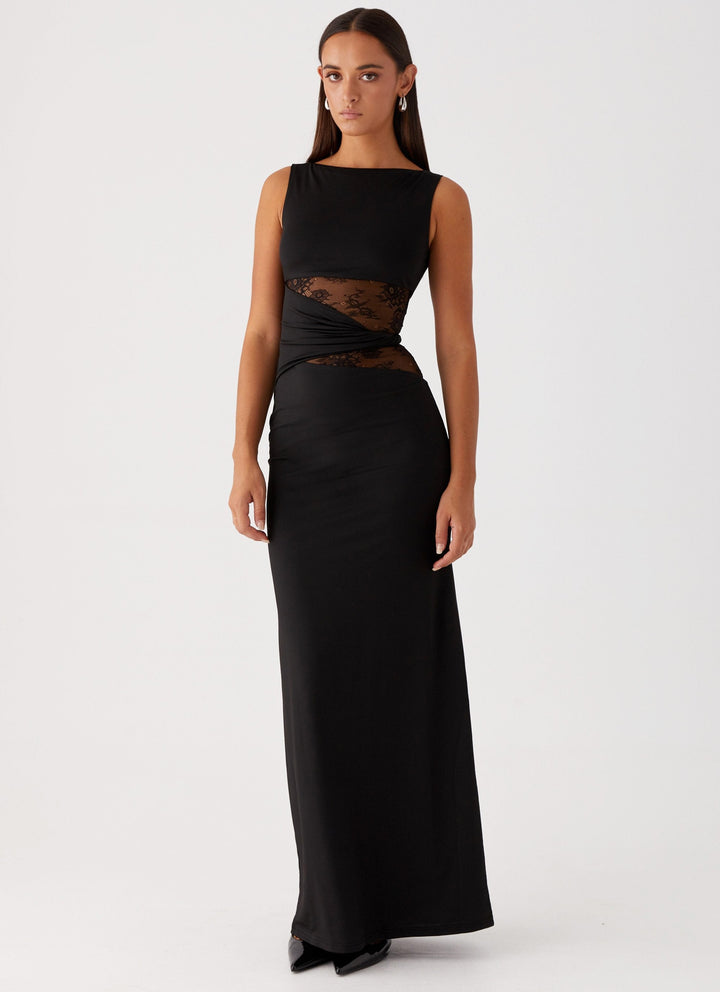 Elegant women's maxi dress with boat neck, sleeveless design, and delicate lace cut-out details, perfect for formal events.