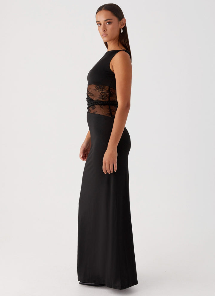 Black elegant women's maxi dress, featuring a boat neck & lace cut-out. Ideal as a formal evening gown or party dress.