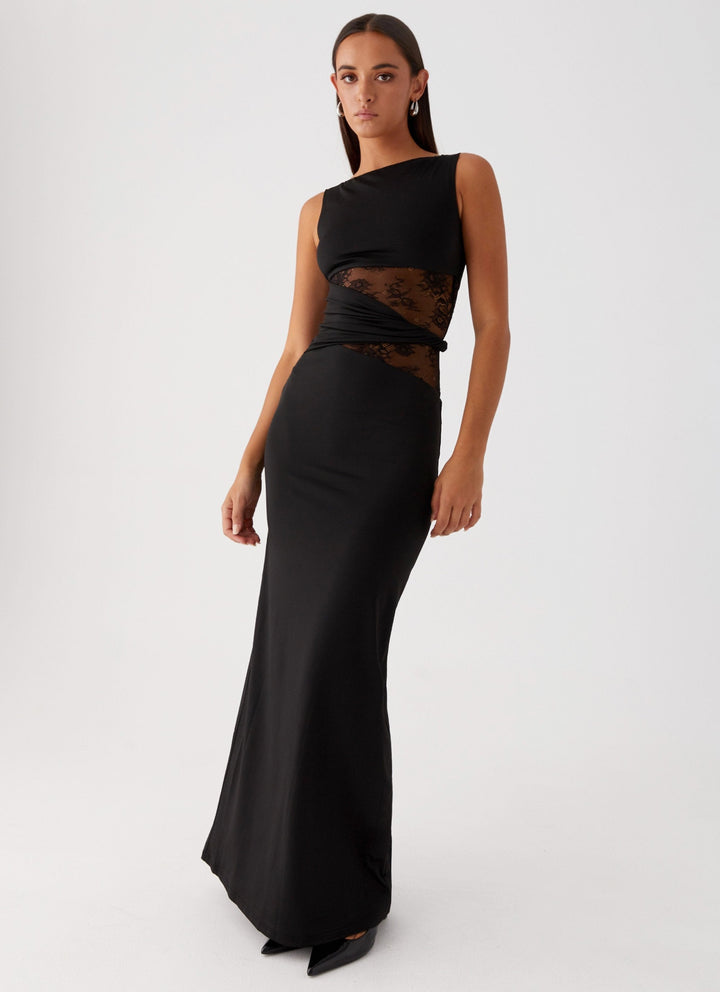 Sophisticated women's sleeveless maxi dress with a chic boat neck and intricate lace cut-out, suitable for special occasions.