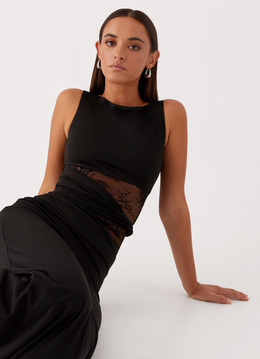 White elegant women's boat neck maxi dress. Sophisticated sleeveless design with a unique lace cut-out for special events.