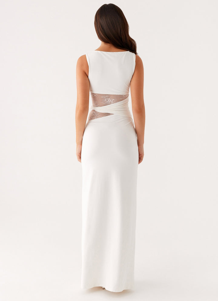 Sleeveless elegant maxi dress for women, featuring a boat neck and stunning lace cut-out details. Ideal for sophisticated events.