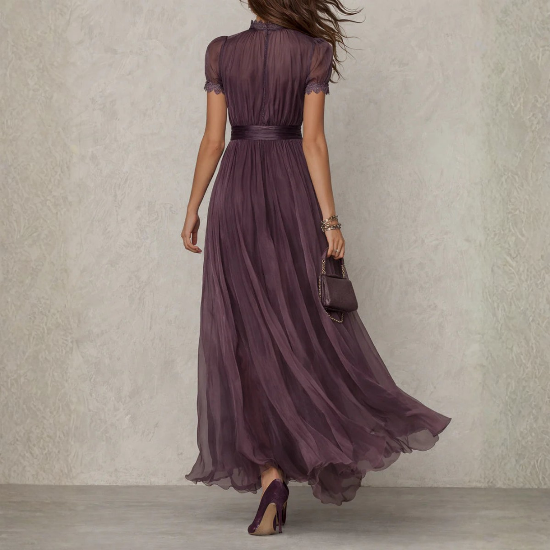Flowing women's maxi dress for special events, featuring exquisite lace trim & elegant design.