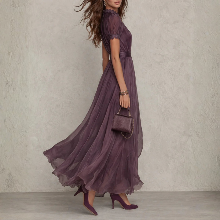 Romantic women's occasion dress; a formal maxi with delicate lace trim & graceful silhouette.