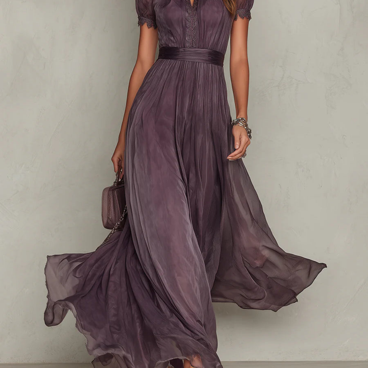 Women's formal maxi dress featuring an elegant design and delicate lace trim, ideal for parties.