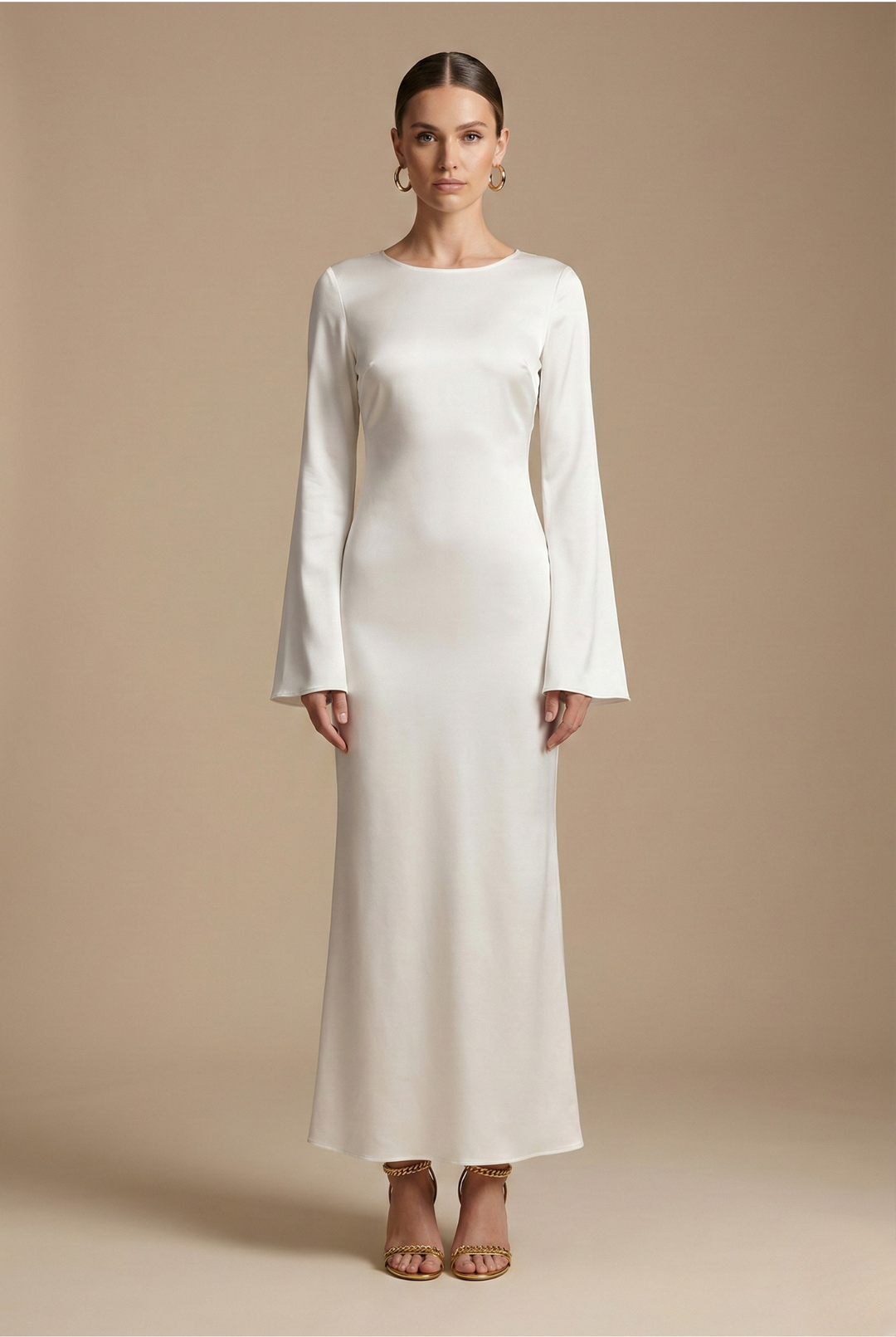 Elegant women's maxi dress with flare sleeves & round neck, perfect for formal occasions & evening wear.