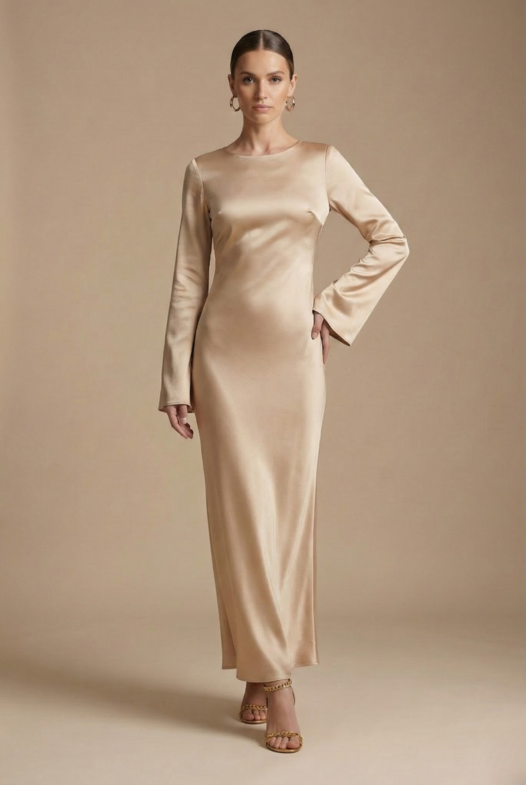 Chic women's special occasion maxi dress. Elegant flare sleeves & round neck define this beautiful column dress.