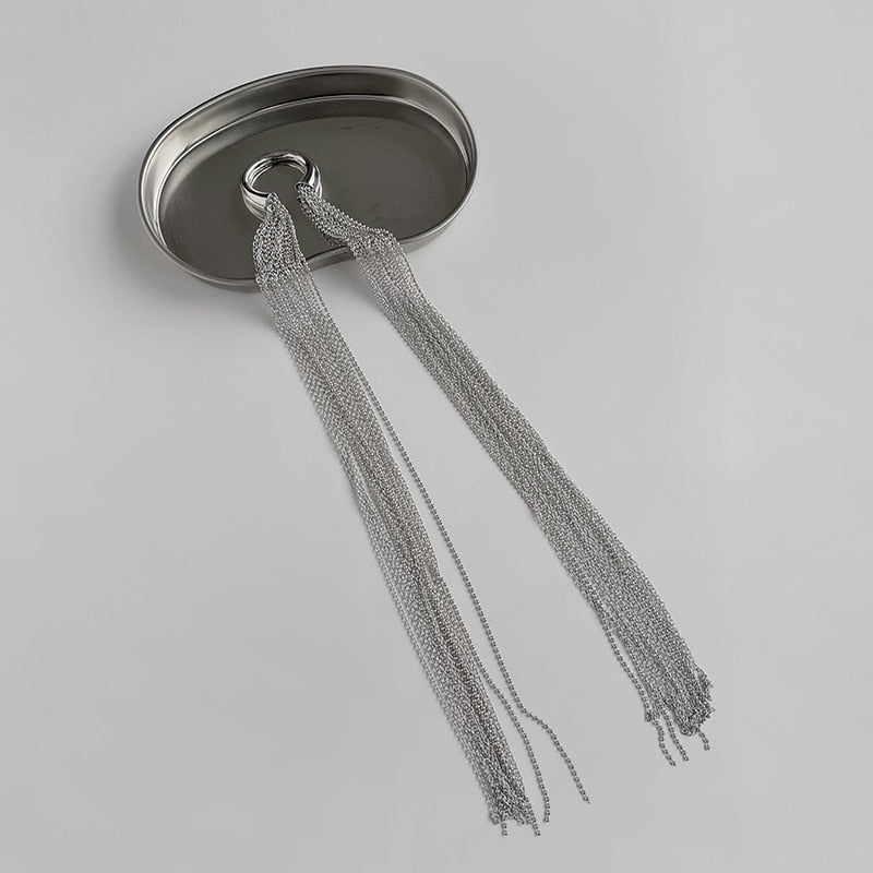 Modern metal tassel hair clip for women's hair. Secure and stylish fashion clip for updos and styles.