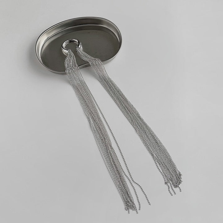 Modern metal tassel hair clip for women's hair. Secure and stylish fashion clip for updos and styles.