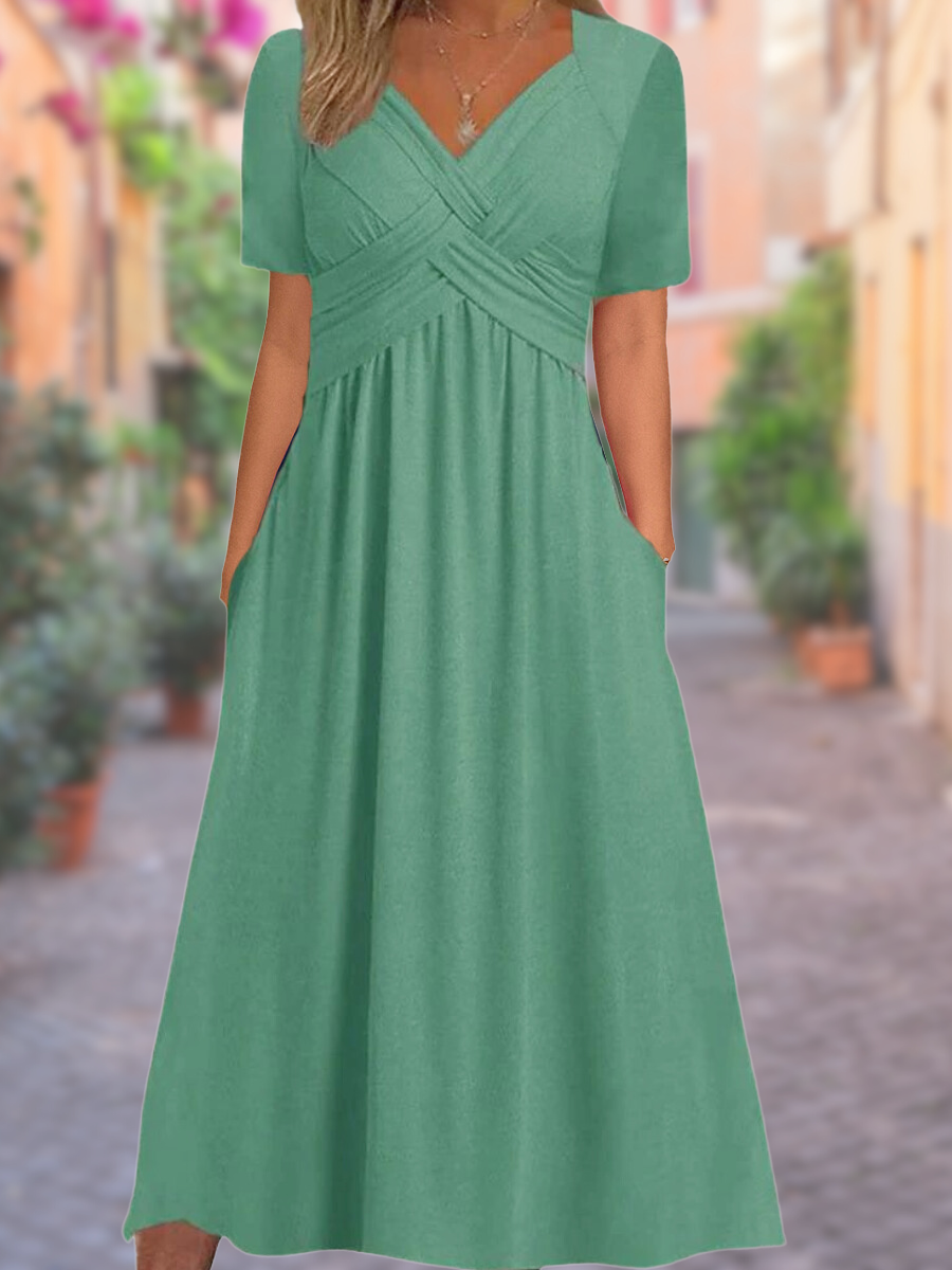 Chic women's V-neck midi dress with an elegant crisscross design, ideal for cocktail or everyday fashion.