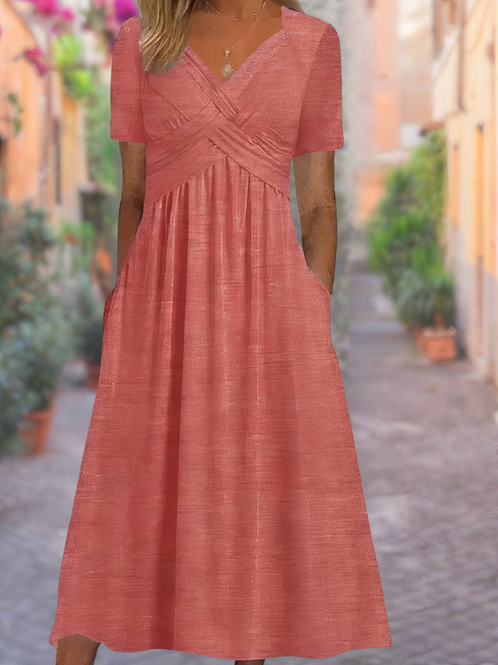 Lightweight women's midi dress, V-neck, crisscross bodice. A versatile and comfortable summer fashion staple.