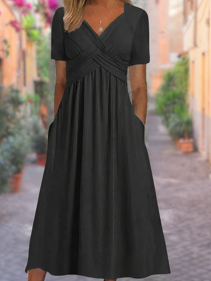 Stylish women's elegant midi dress with a flattering V-neck and crisscross bodice, offering chic apparel.