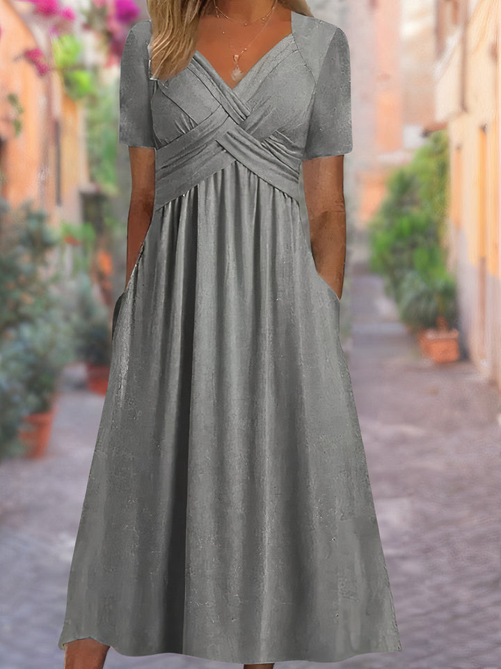 Women's elegant V-neck midi dress featuring a chic crisscross bodice; a perfect versatile summer apparel.