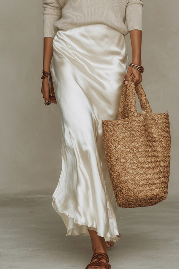Chic knit midi dress & coordinating sweater set for women, ideal for effortless elegance & comfortable style.