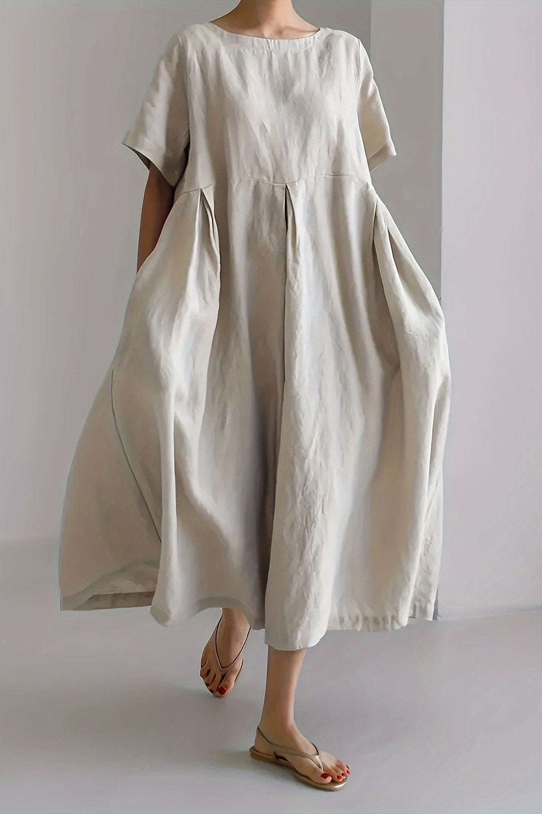Classic women's elegant midi dress, ideal for various sophisticated occasions, cocktail parties, or evening events.