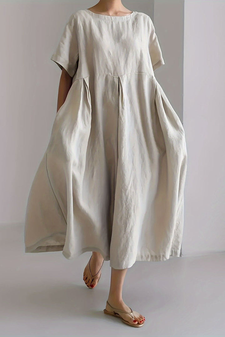 Classic women's elegant midi dress, ideal for various sophisticated occasions, cocktail parties, or evening events.
