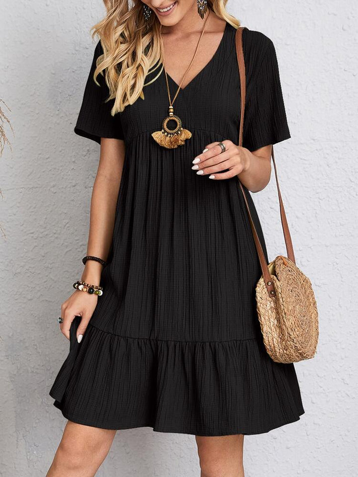 Comfortable women's midi dress, elegant & versatile. Features flattering belly coverage for chic fashion.