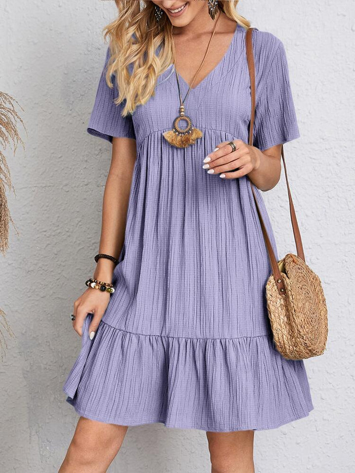 Summer style women's midi dress, comfortable and elegant. Offers a flattering look with great belly coverage.