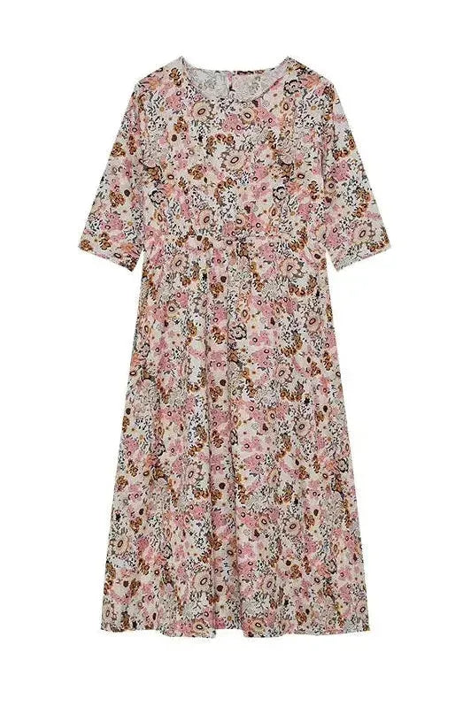Classic women's button midi dress, elegant & easy-care. A flattering, versatile style for timeless fashion.