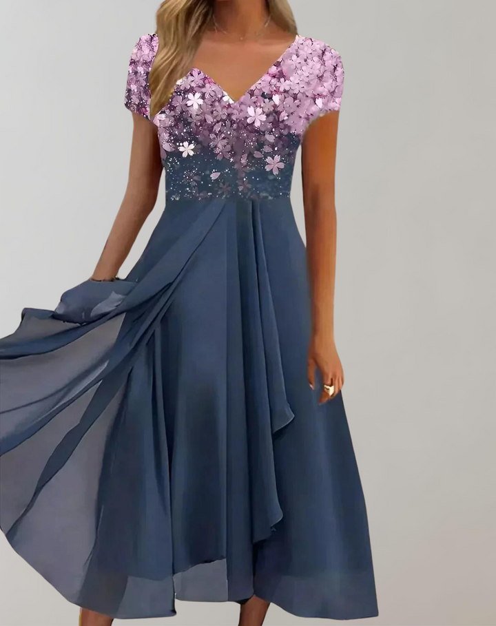Formal women's midi dress featuring elegant floral embellishments. Ideal for evening events & special occasions.