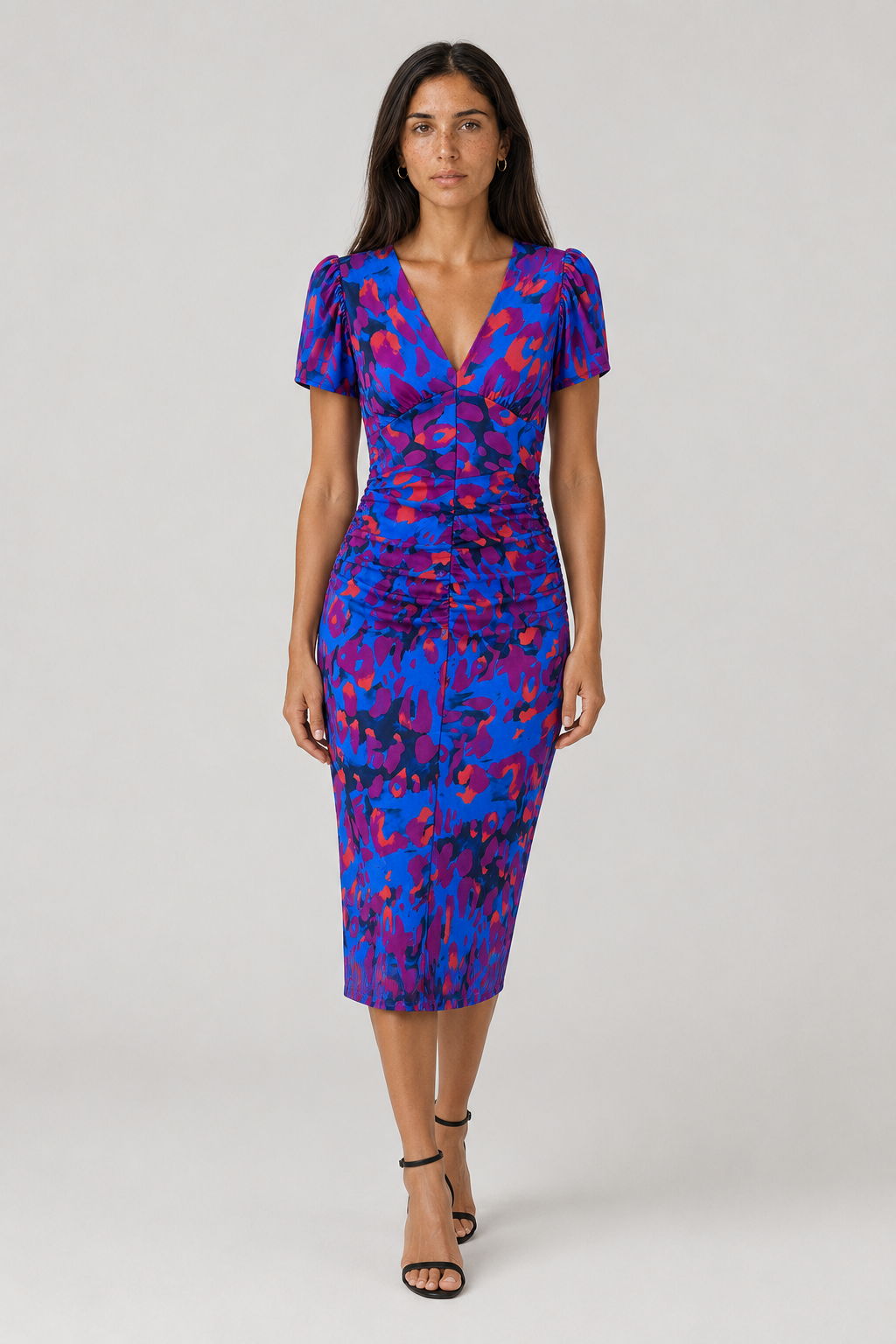 Elegant women's midi dress with puff sleeves, gathered waist, and abstract print. V-neck for spring/summer fashion.