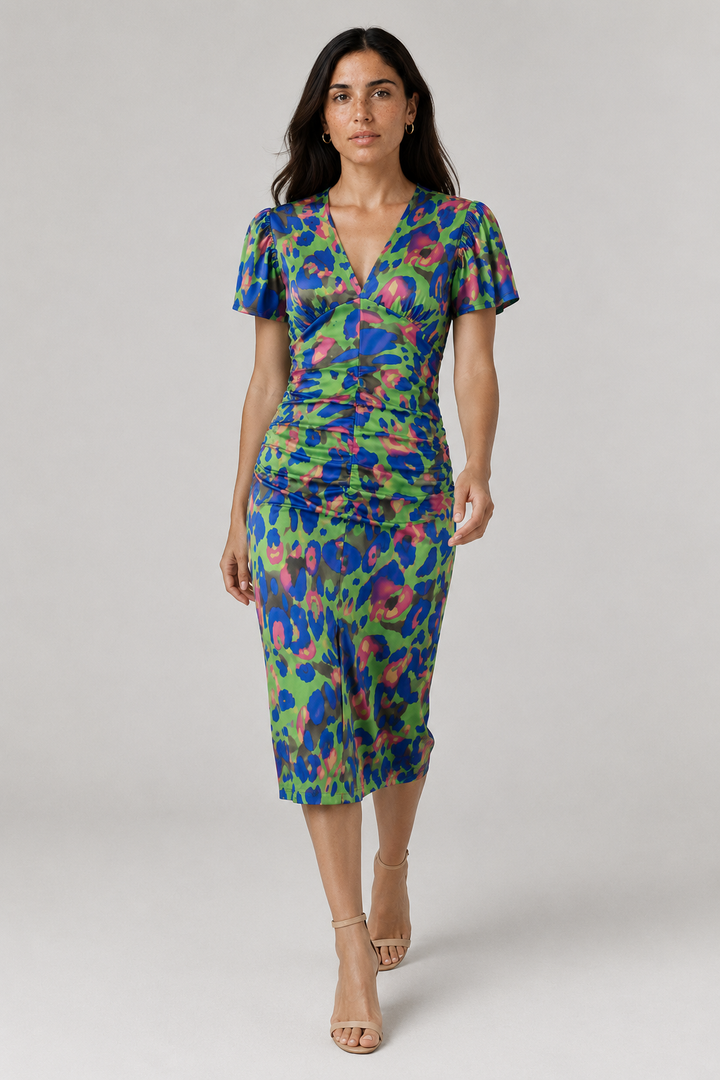 Women's elegant V-neck midi dress with puff sleeves, gathered waist, and a unique abstract pattern.