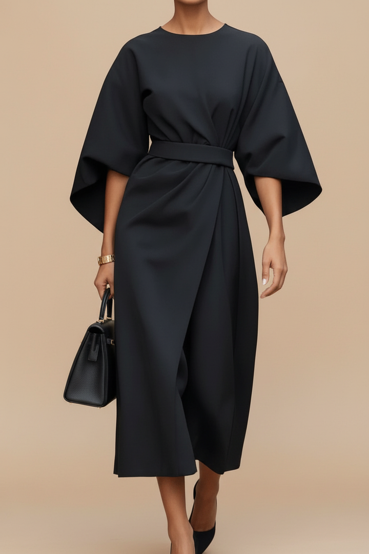 Stylish women's midi dress with lantern sleeves, offering a timeless and elegant look.