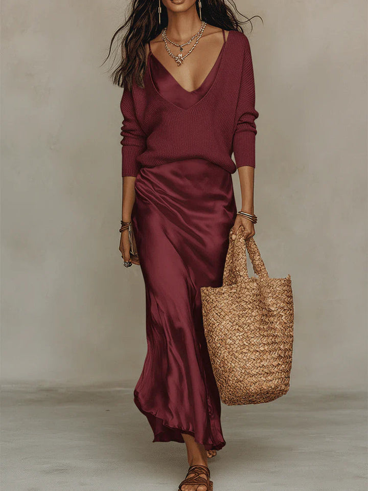 Stylish women's elegant midi dress featuring a versatile sweater. Perfect for a polished look.