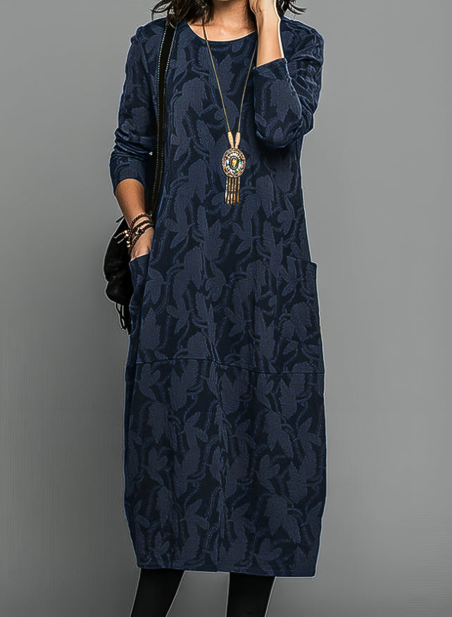 Flattering women's formal midi dress, perfect as a wedding guest or special occasion evening wear. Elegant fashion.