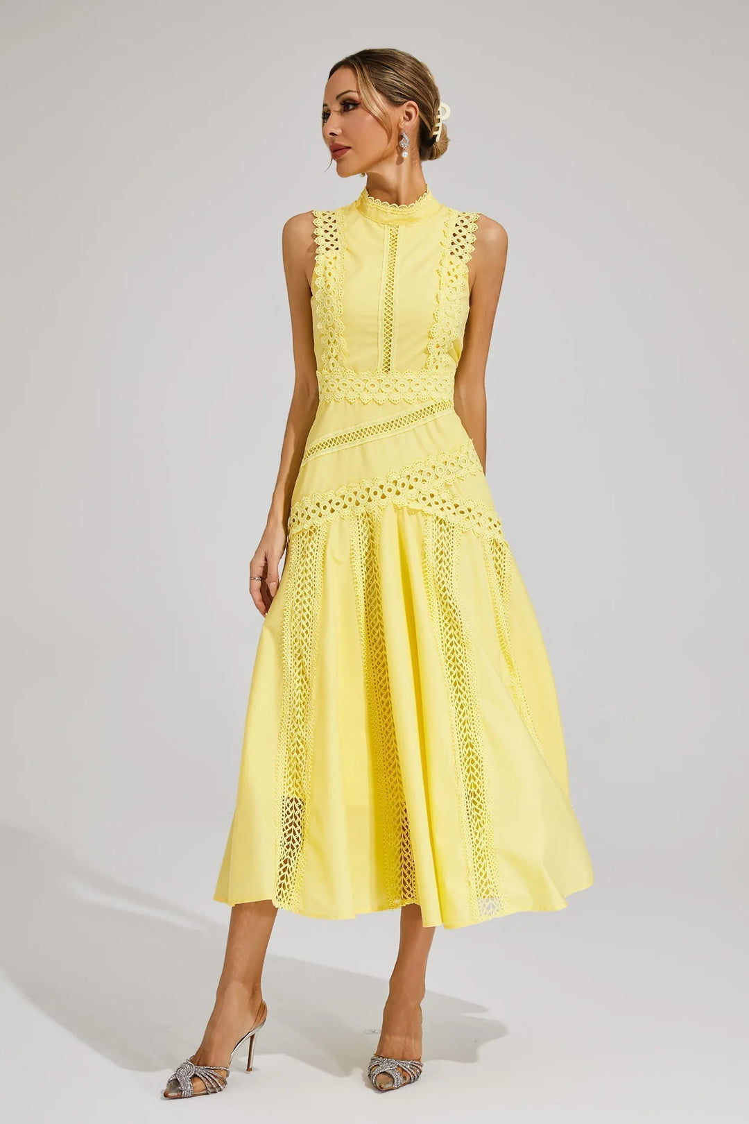 Beautiful women's sleeveless mock neck A-line midi dress, intricate lace detailing for elegance.