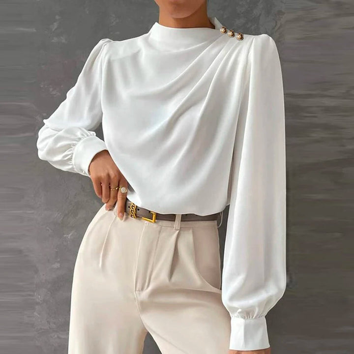 Versatile women's long sleeve mock neck blouse, featuring chic ruching & polished gold buttons for smart casual.