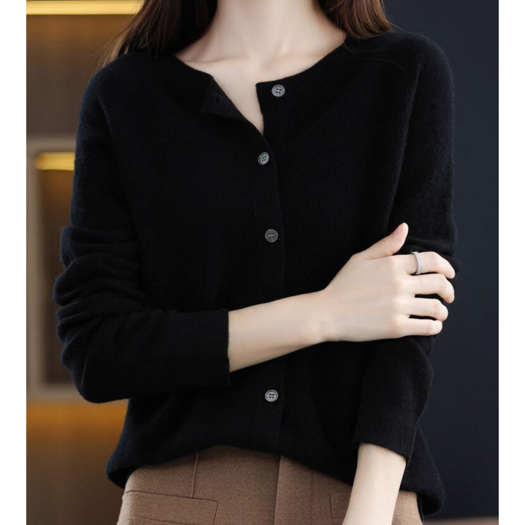 Women's elegant O-neck cardigan, button-front detail, suitable for sophisticated office looks.