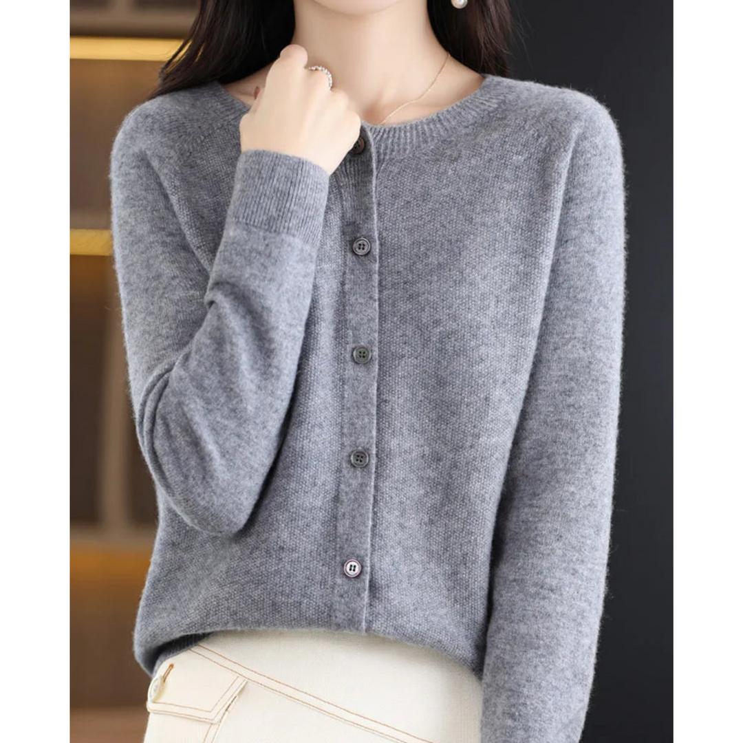 Fashionable long-sleeve women's cardigan with an O-neck and smart button front closure.