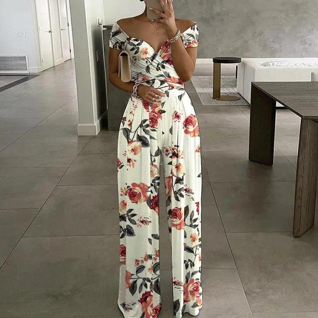 Elegant women's off-shoulder floral wide-leg jumpsuit, perfect for summer casual chic or vacation wear.