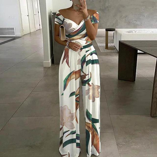 Chic women's floral off-shoulder wide-leg jumpsuit for parties, summer events, or stylish vacation outfits.
