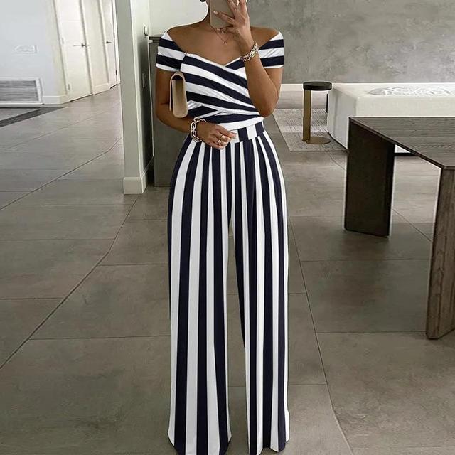 Comfortable women's floral print wide-leg jumpsuit with an elegant off-shoulder design for summer fashion.
