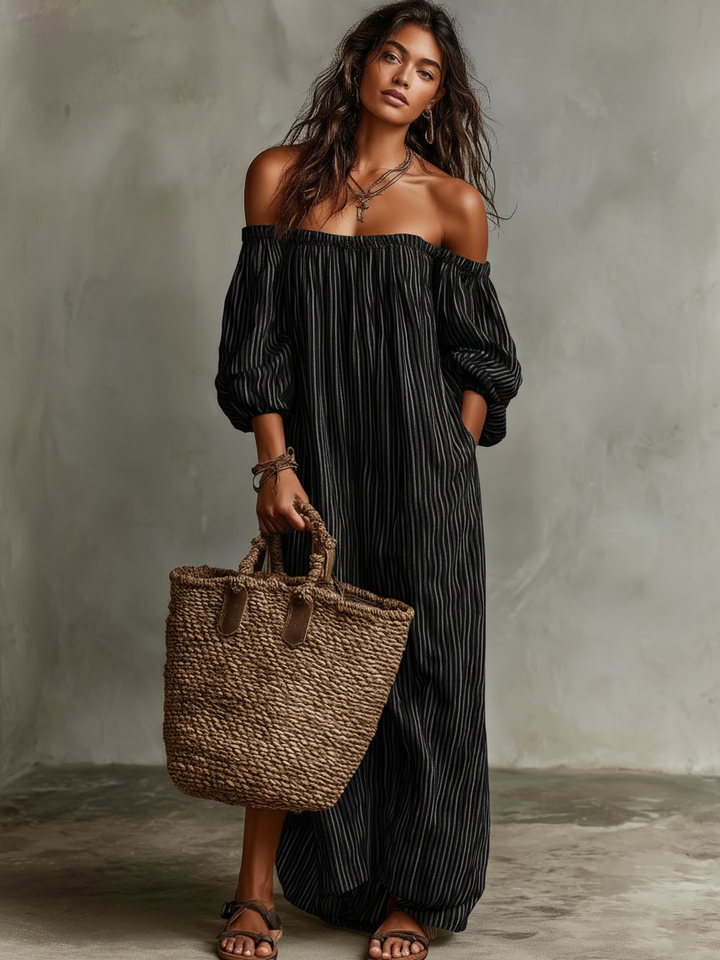 Stylish women's off-shoulder maxi dress with long sleeves, great for summer vacation & elegant resort fashion.