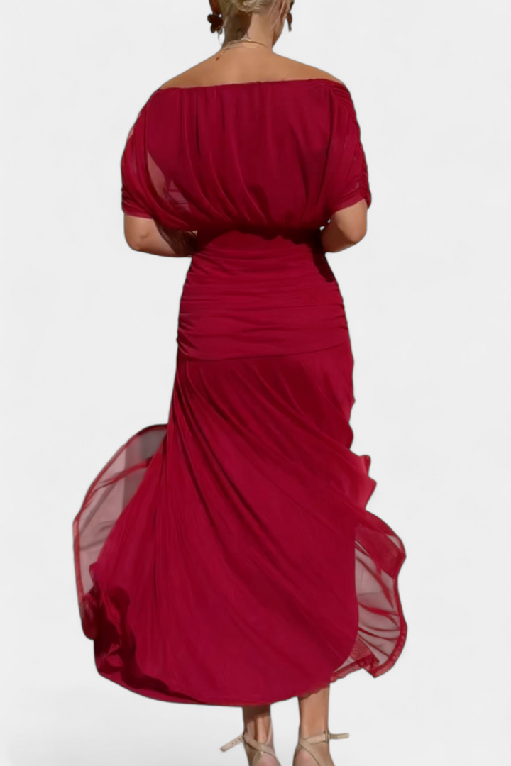 Beautifully draped off-shoulder women's maxi dress, an elegant evening gown for special occasions.