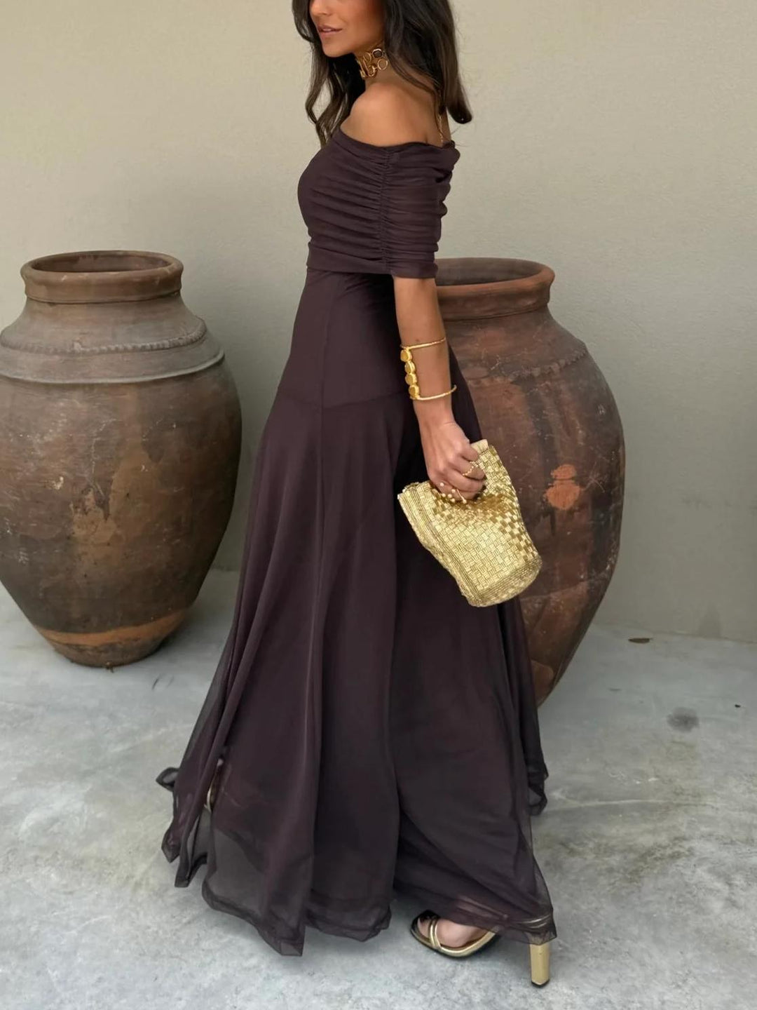 Formal off-shoulder maxi gown for women, an elegant choice for evening wear.
