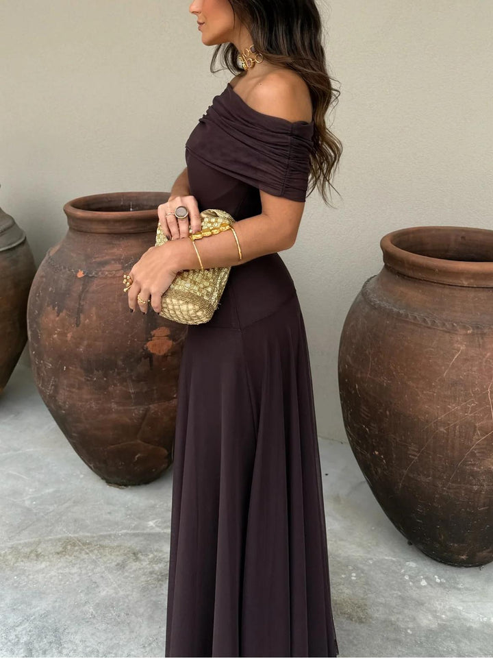 Women's elegant off-shoulder A-line maxi dress, perfect for formal occasions.
